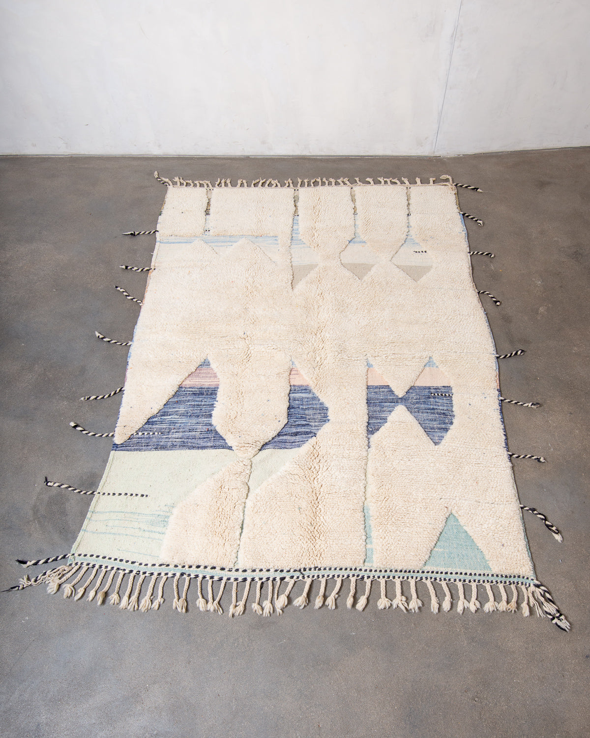 Modern, designer, handcrafted Berber rug from Morocco. Beniourain carpet with beautiful colours and patterns and fluffy wool texture.